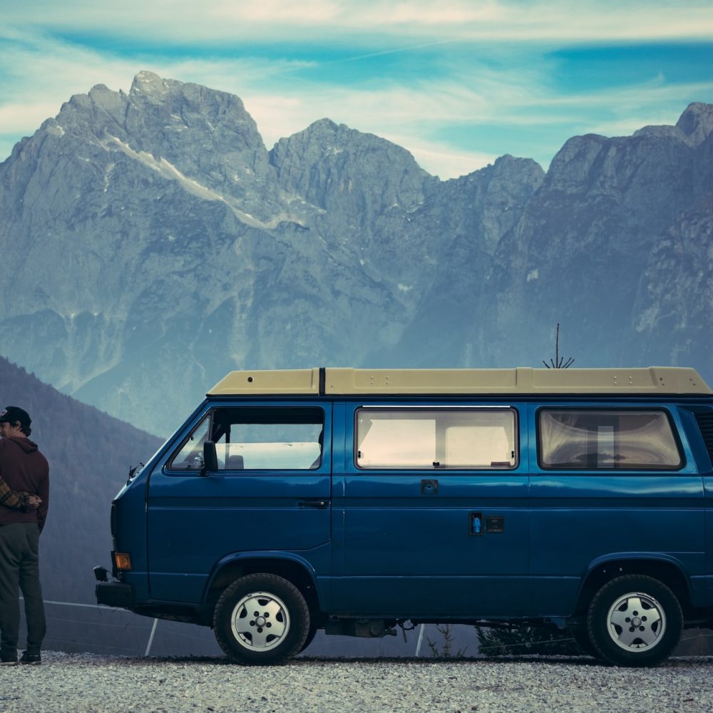 cool blue t4 camper with stunning scenery